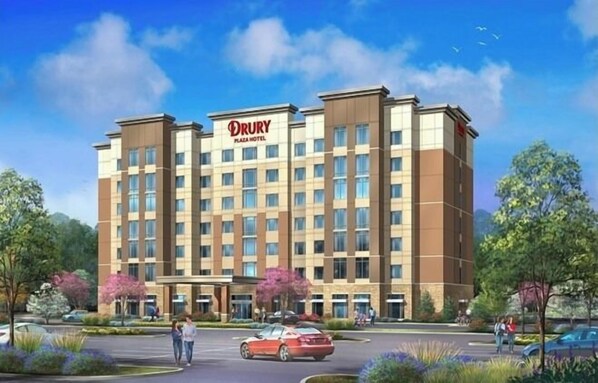 A Drury Plaza Hotel with a modern design, featuring a central entrance, multiple floors, and a parking area with cars and pedestrians.