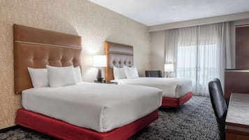 Desk, laptop workspace, iron/ironing board, free cribs/infant beds