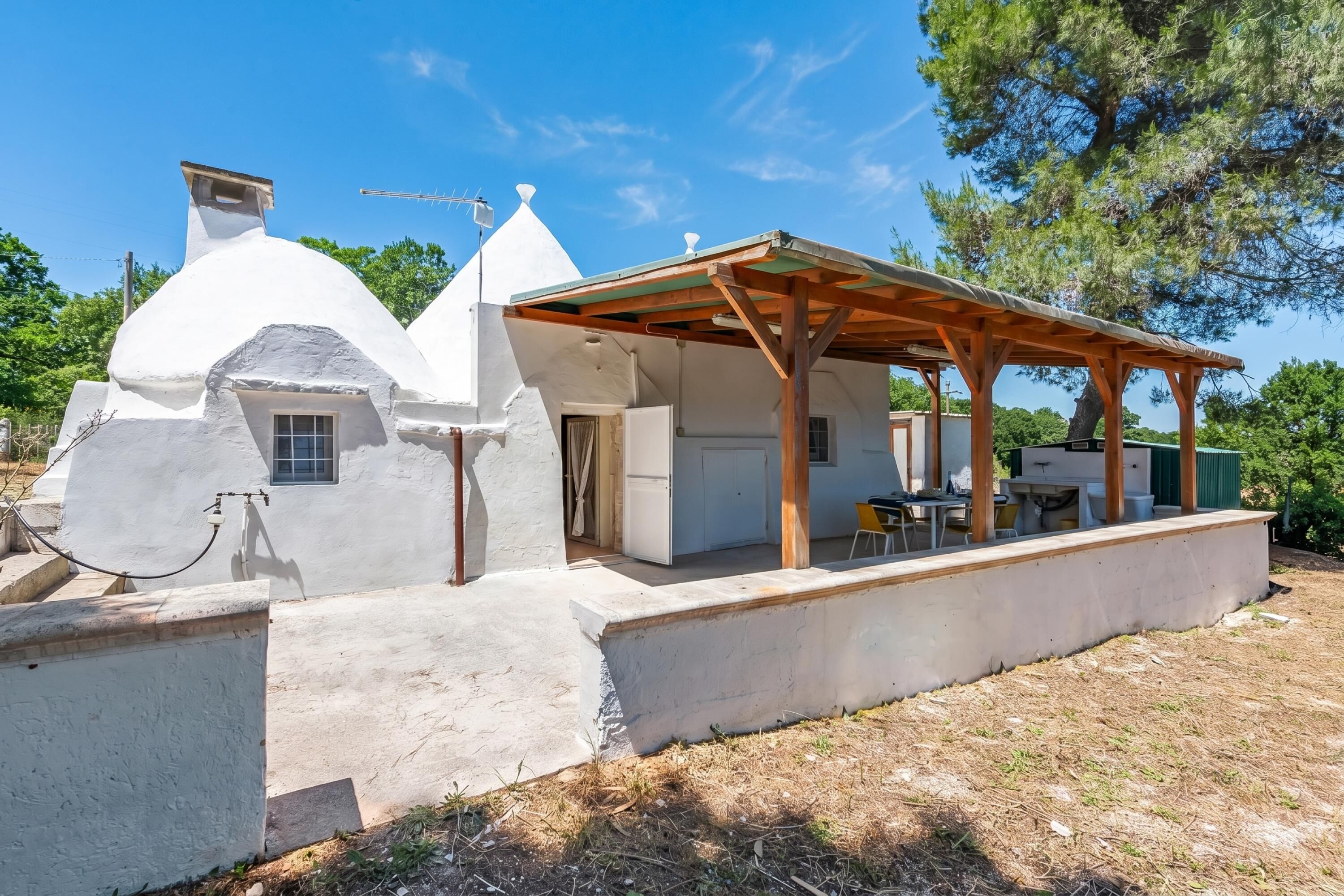 Familie villa, meerdere slaapkamers, uitzicht op gebergte (Trullo del Bosco In Martina Franca) | Buiten dineren