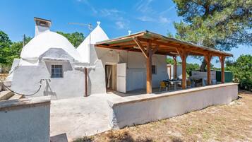 Family Villa, 1 Bedroom, Microwave, Mountainside (Trullo del Bosco In Martina Franca) | Outdoor dining