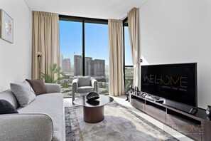 Leilighet – deluxe, balkong, byutsikt | Oppholdsområde