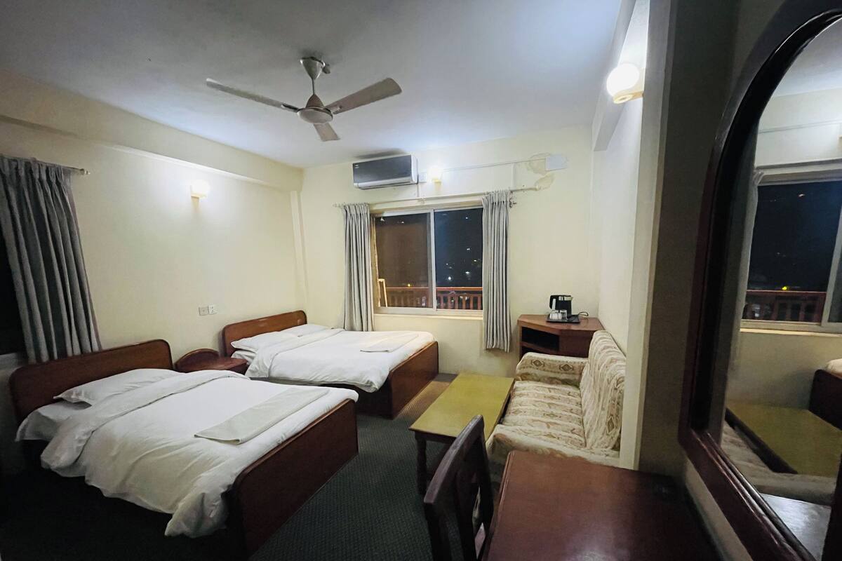 Desk, laptop workspace, free WiFi, bed sheets