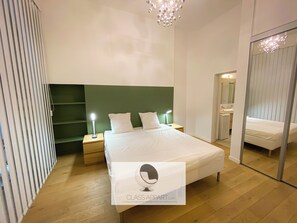 2 quartos, ferros/tábuas de passar roupa, Wi-Fi de cortesia