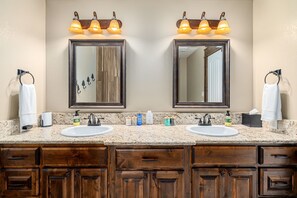 Shower, hair dryer, towels, shampoo