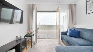Apartment, 1 Bedroom, Balcony | Living room | 43-inch Smart TV with digital channels