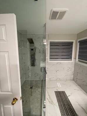 Hair dryer, towels, soap, shampoo