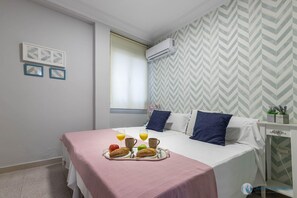 2 habitaciones, tabla de planchar con plancha, wifi y ropa de cama 