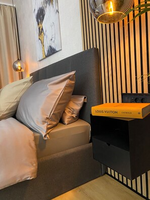 1 quarto, cofres nos quartos, ferros/tábuas de passar roupa