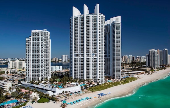 On the beach, sun-loungers, beach towels