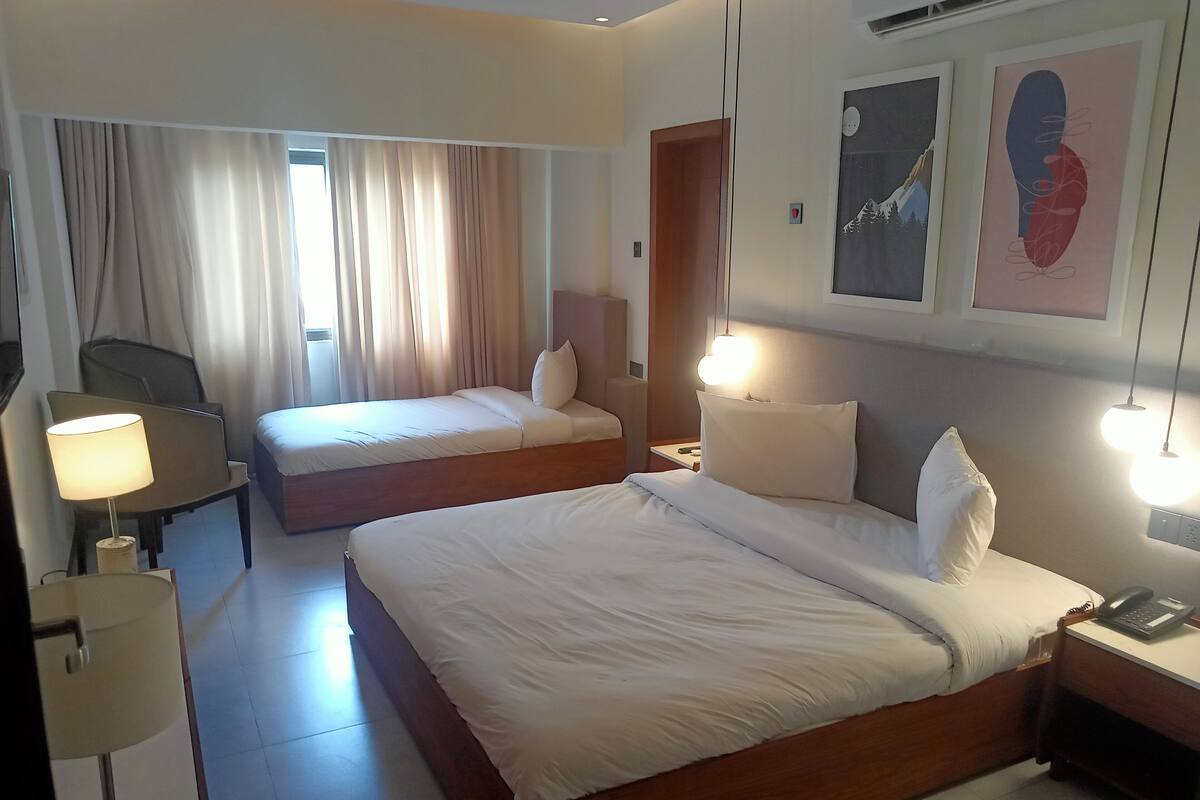 Chambre Triple Deluxe | 1 chambre, Wi-Fi gratuit, draps fournis