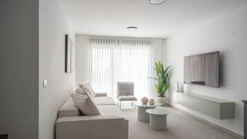Departamento exclusivo | Área de sala de estar | Televisión