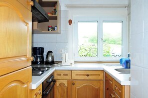 Refrigerador, horno, placa de cocina, cafetera/tetera