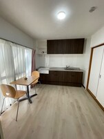 Economy Single Room, Balcony | Living area