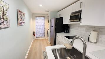 Coffee/tea maker, fridge, microwave, dishwasher