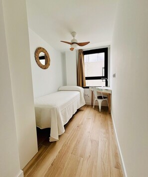 2 habitaciones, tabla de planchar con plancha, wifi y ropa de cama