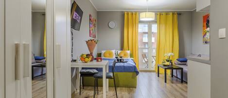 Classic Apartment, Balcony, City View | 1 bedroom, blackout drapes, iron/ironing board, cribs/infant beds