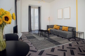 Familien-Vierbettzimmer, Stadtblick | Wohnbereich