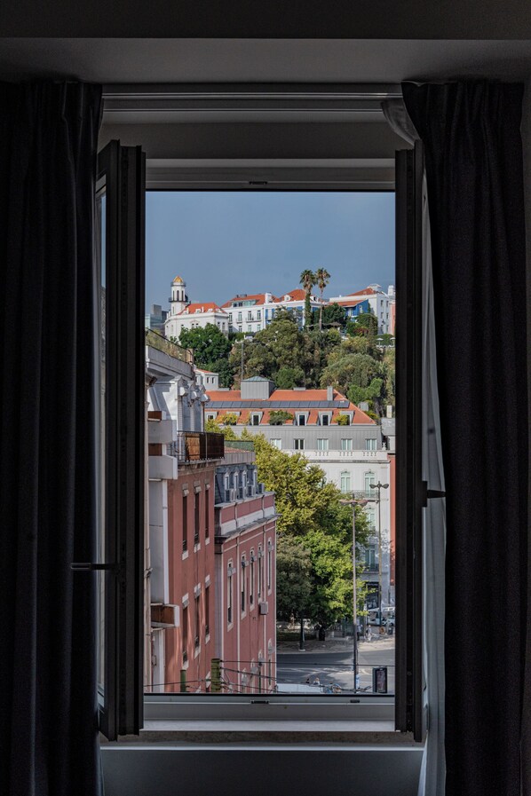 Familien-Vierbettzimmer, Stadtblick | Wohnbereich