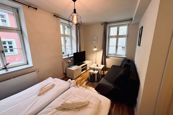 Schlafzimmer mit Wohnbereich