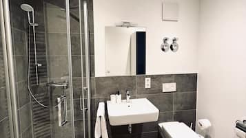 Hair dryer, towels, soap, toilet paper