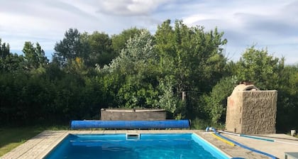 Cozy 2-bedroom house with WiFi, AC in amazing El Maiten