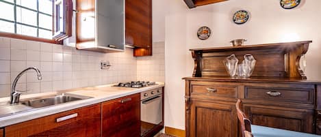 Apartment, Balcony, Garden View | Private kitchen | Fridge, oven, stovetop, espresso maker