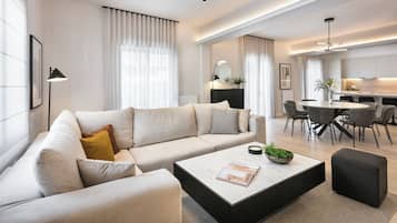 Departamento de lujo, 4 habitaciones, balcón, vista a la ciudad | Área de sala de estar