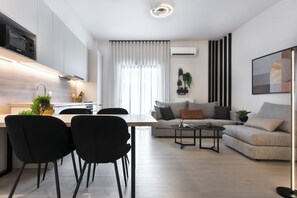 City Apartment, 2 Bedrooms, Balcony, City View | Living area - Athenian Modern & Luxury Apartments (Vyronas)