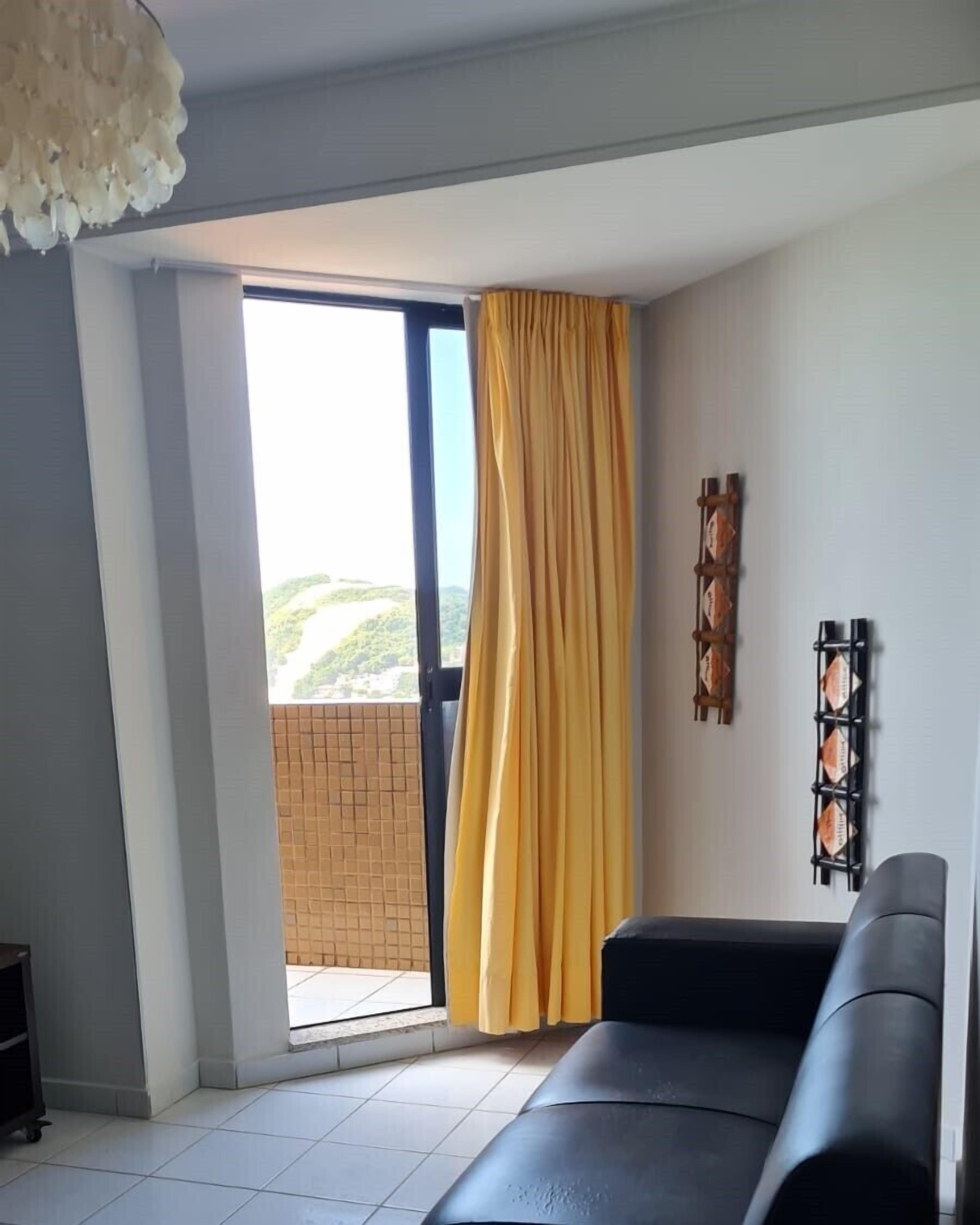 Apartamento conforto | Área de estar | TV