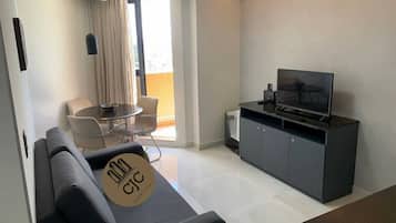 Comfort Apartment | Living area | TV