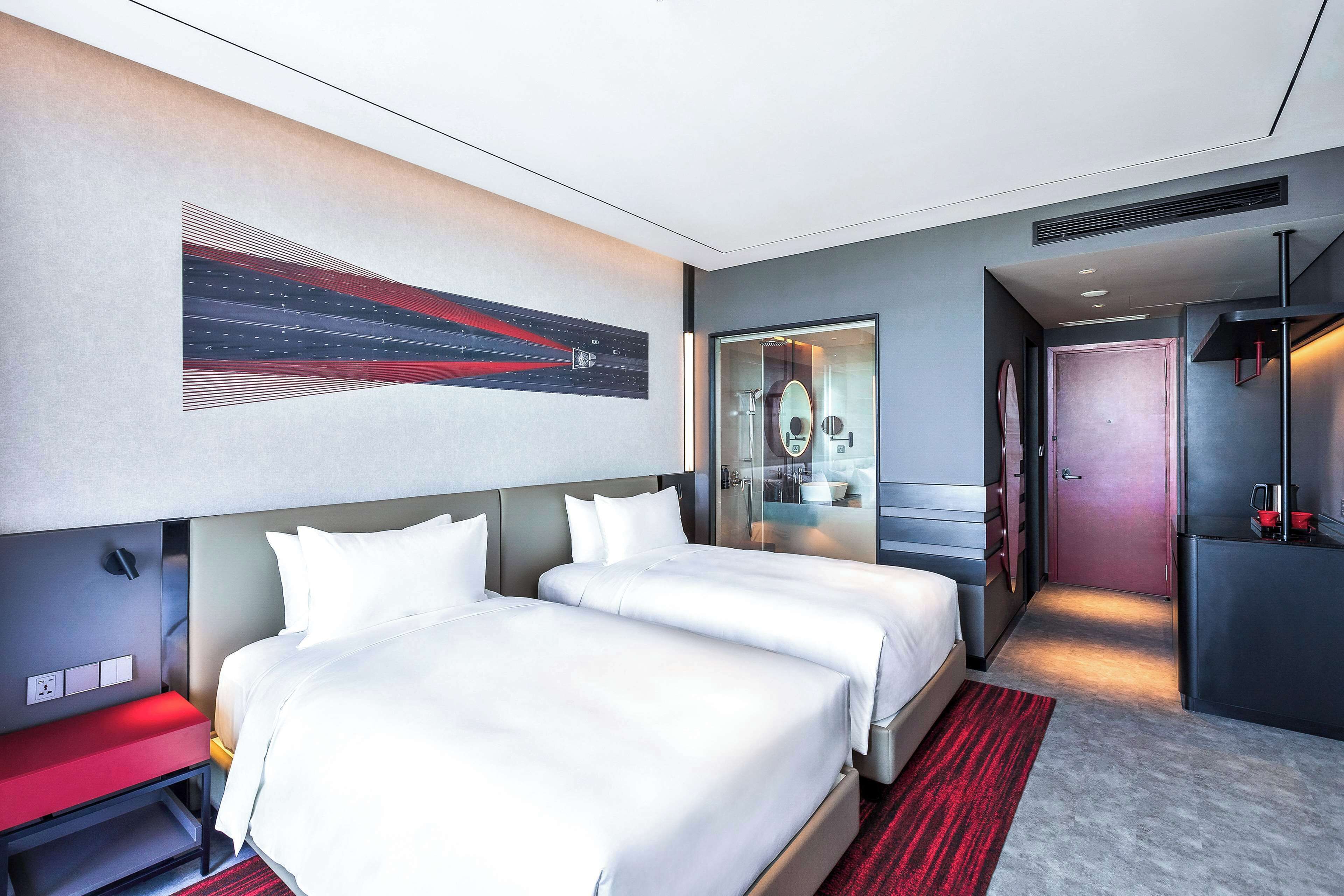 Premium bedding, down comforters, memory foam beds, in-room safe