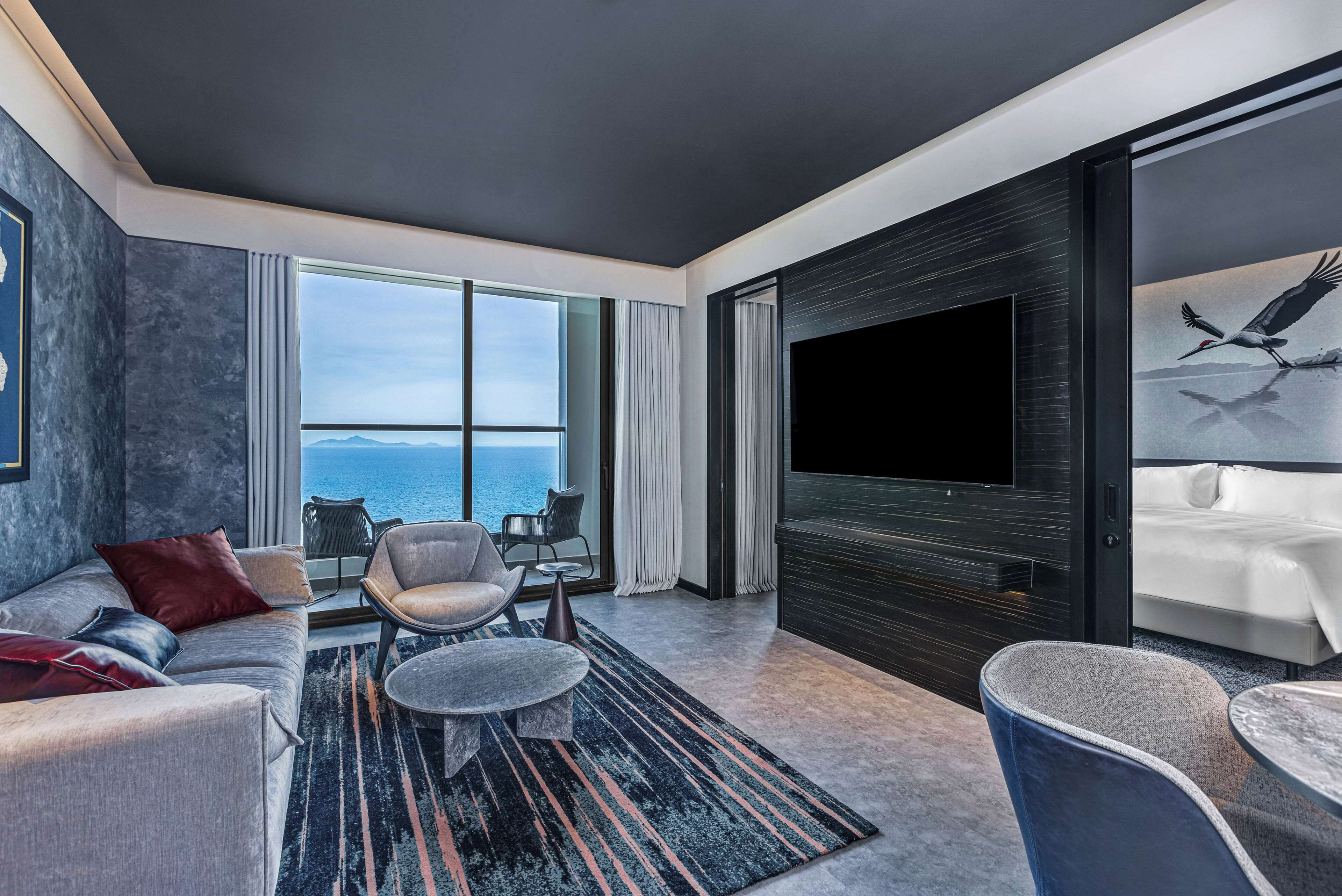 Suite, Non Smoking, Ocean View | Living room | 50-inch Smart TV with cable channels
