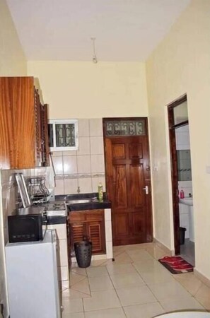 Fridge, microwave, electric kettle, toaster