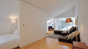 Panoramic Loft, Balcony, River View | Living area | Flat-screen TV