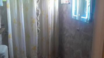 Shower, towels, soap, shampoo