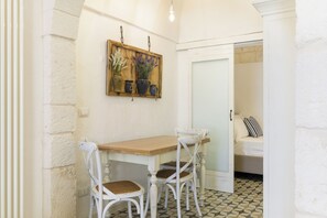 Apartment | Living area | 35-inch flat-screen TV with digital channels - La Dimora del Tempo by Wonderful Italy (Ostuni)