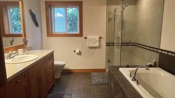 Jetted bath, hair dryer, towels, soap