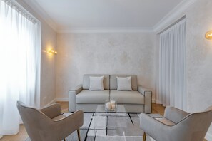 Suite Rossini 10 | Área de estar | TV