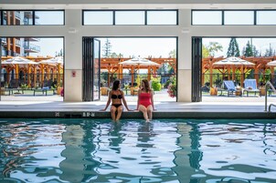 Indoor pool, outdoor pool, pool umbrellas, sun loungers