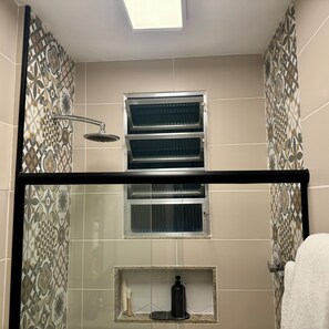 Shower, hair dryer, towels, soap