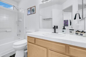 Hair dryer, towels, soap, toilet paper