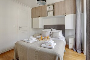 2 habitaciones, tabla de planchar con plancha, wifi y ropa de cama 