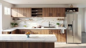 A modern kitchen with wooden cabinets, a marble countertop, a built-in sink, and a stainless steel refrigerator.