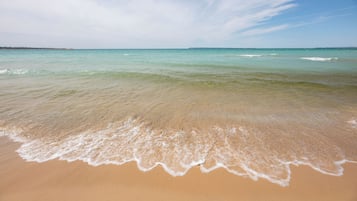 Espreguiçadeiras, toalhas de praia