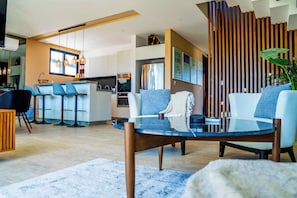 Premium Penthouse, 3 Bedrooms | Living area | Flat-screen TV