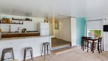 Fridge, microwave, stovetop, coffee/tea maker