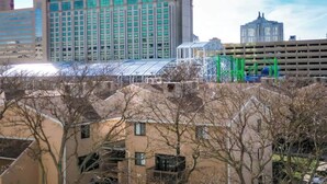 A hotel with a large sign reading "SHOWBOAT" and a modern glass facade.