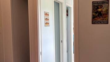 1 bedroom, desk, bed sheets