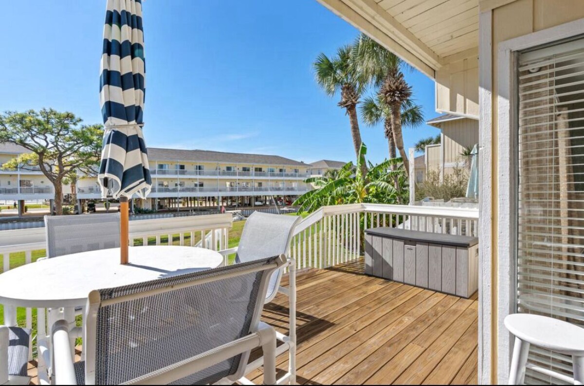 Photo 2 of Coastal Charm, CANAL FRONT 🌴Condo, 5 Pools, Hot Tub, walk to beach Dog-Friendly!