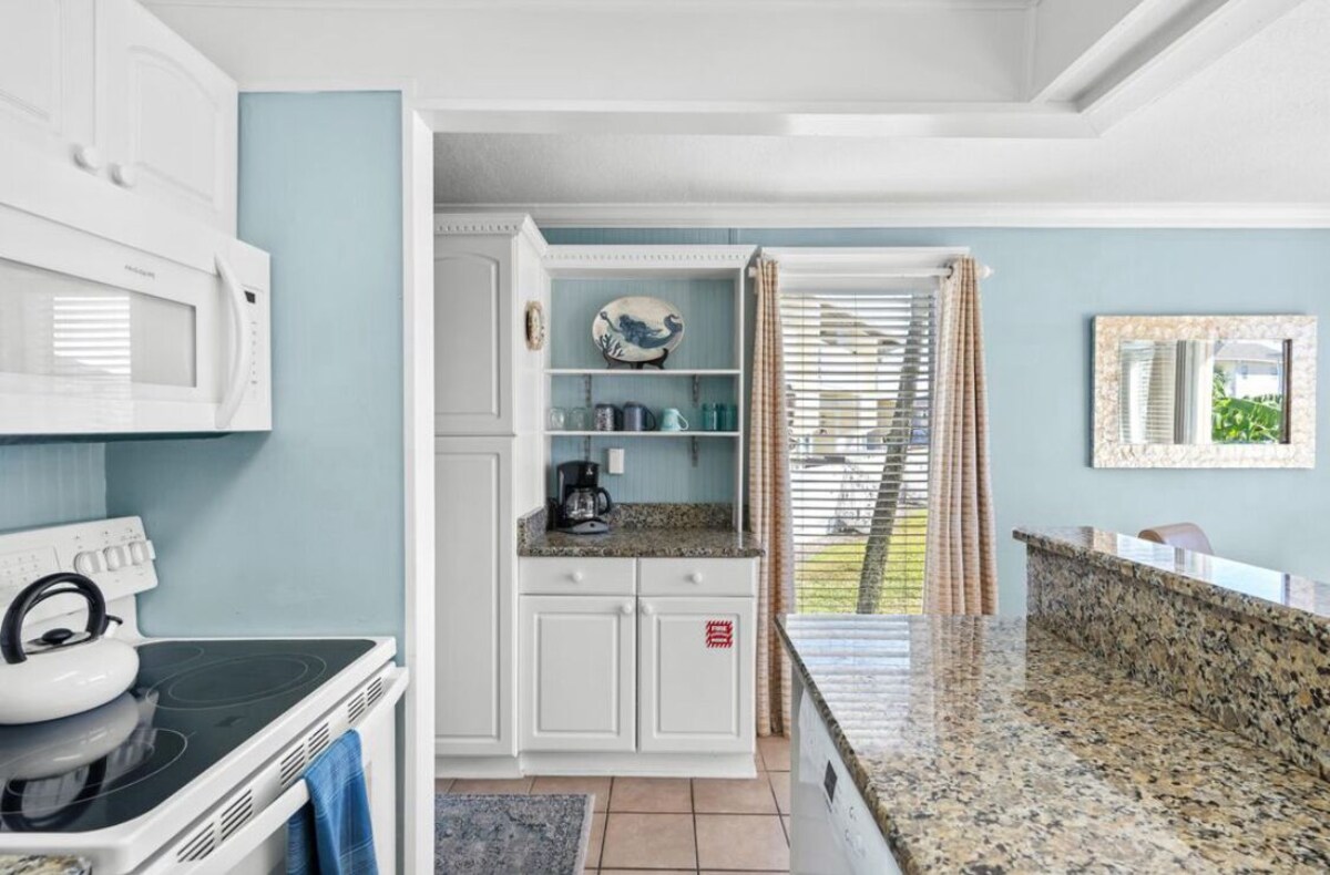 Photo 18 of Coastal Charm, CANAL FRONT 🌴Condo, 5 Pools, Hot Tub, walk to beach Dog-Friendly!